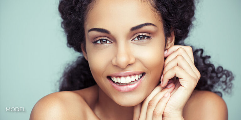 Portrait of a beautiful young African woman smiling.